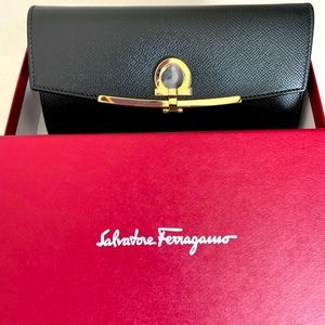 Salvatore Ferragamo wallet. New with tags in box.